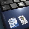 An Intel Inside sticker is shown next to a Windows XP sticker on an Acer Netbook.