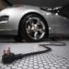 A plug is seen coming from the Chevrolet Volt electric car during the North American International Auto Show in Detroit, Michigan January 13, 2009.