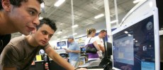 Customers test an HP Laptop