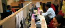  A tutor works at TutorVista headquarters in the early morning of April 13, 2008 in Bangalore, India