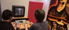 Gamers check out a vintage console at a museum in Berlin