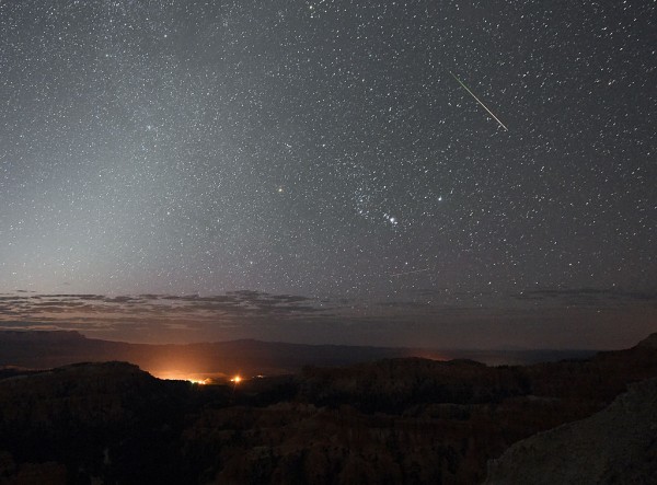  A Perseid meteor streaks across the sky above Inspiration Point early in Bryce Canyon National Park, Utah. 