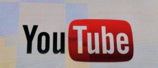 The YouTube logo appears on screen at the International Consumer Electronics Show at the Las Vegas Hotel & Casino in Las Vegas, Nevada. 