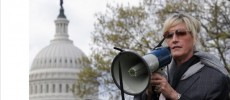 Consumer advocate Erin Brockovich, who highlighted toxic chemical chromium -6, addresses a rally against the federal government's support for what they say is a known polluter on Capitol Hill in Washi