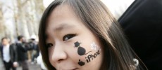 Customers wait in a line for the latest Apple iPhone in Seoul, South Korea.