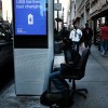  A man uses one of the new Wi-Fi kiosks that offer free web surfing, phone calls and a charging station in New York City. 
