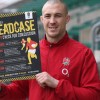  Mike Brown, the England fullback, is seen supporting the RFU's latest concussion awareness initiative with a promotional poster.
