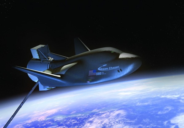 Rendering of SNC's Dream Chaser Spacecraft and Cargo Module in orbit.