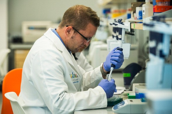  Research technicians prepare DNA samples to be sequenced in the production lab of the New York Genome Center in New York City.