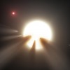 This artist’s conception shows a star behind a shattered comet. (NASA/JPL-Caltech)