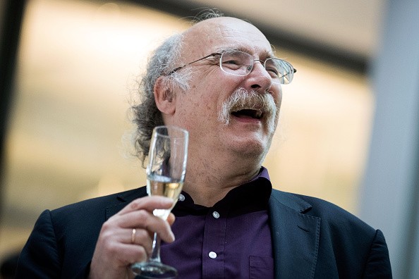 Princeton University professor F. Duncan Haldane, who was awarded the 2016 Nobel Prize in Physics, laughs during a toast in his honor in Princeton, New Jersey.