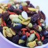 A typical vegan snack of berries, nuts and beans.