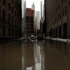  Water floods a street in lower Manhattan, New York