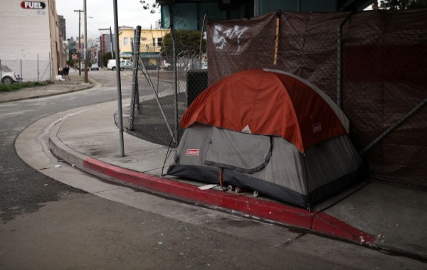 A homeless tent on a sidewalk in San Francisco.