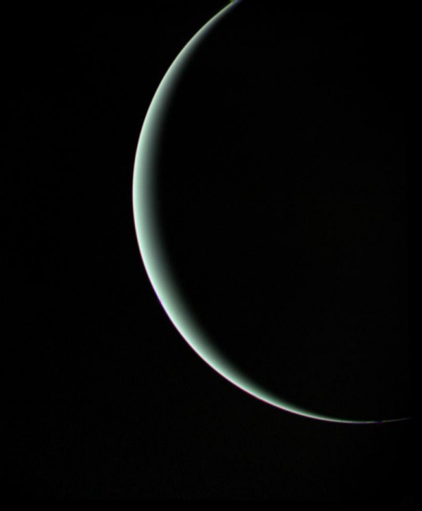 Voyager 2 captured this moody parting shot of Uranus as the spacecraft sped off toward its next adventure at Neptune.