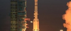 The Shenzhou-11 spacecraft is launched on top of a Long March booster rocket in China's Gobi Desert on Sunday.