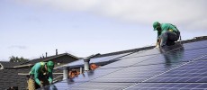 Workers installing a solar roof for San Mateo, California-based solar-panel company SolarCity Corp.