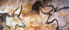 Cave painting of aurochs, horses, and deer at Lascaux, France.