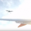 A drone approaching the wing of an airplane.
