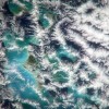 Satellite imagery reveals hexagonal-shaped clouds over the Bermuda Triangle.