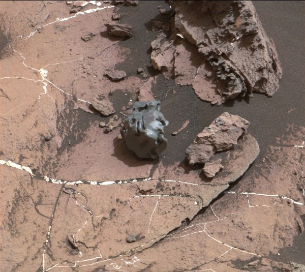 The rock at the center of this image from the Mast Camera (Mastcam) on NASA's Curiosity Mars rover was examined with laser pulses and confirmed to be an iron-nickel meteorite. (NASA/JPL-Caltech/MSSS)