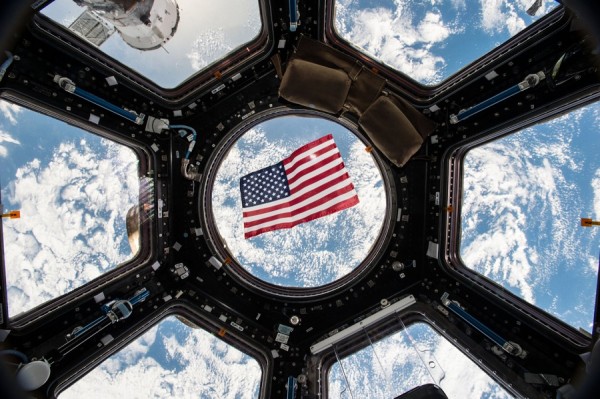 Kjell Lindgren posted this image on social media of the US flag floating in the Cupola module. (NASA/Tumblr)