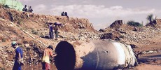 This massive metal cylinder fell from the sky and crashed in a jade mine in Myanmar. (Facebook)