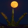 The supermoon is seen rising behind the Soyuz rocket at the Baikonur Cosmodrome launch pad in Kazakhstan. (NASA/Bill Ingalls)