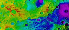Using colorized topography, Mercury’s “great valley” (dark blue) and Rembrandt impact basin (purple) are revealed in this high-resolution digital elevation model merged with an image. (NASA)