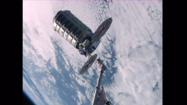 The Orbital ATK Cygnus space freighter is seen moments after being released from the grips of the Canadarm2 robotic arm. (NASA TV)